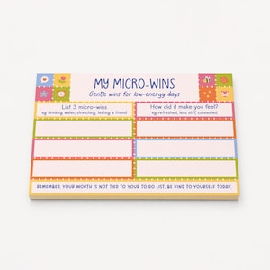 May include: A rectangular notepad titled MY MICRO-WINS Gentle wins for low-energy days. It features colorful borders with small icons, two columns for listing micro-wins and feelings, and the text REMEMBER, YOUR WORTH IS NOT TIED TO YOUR TO DO LIST, BE KIND TO YOURSELF TODAY.