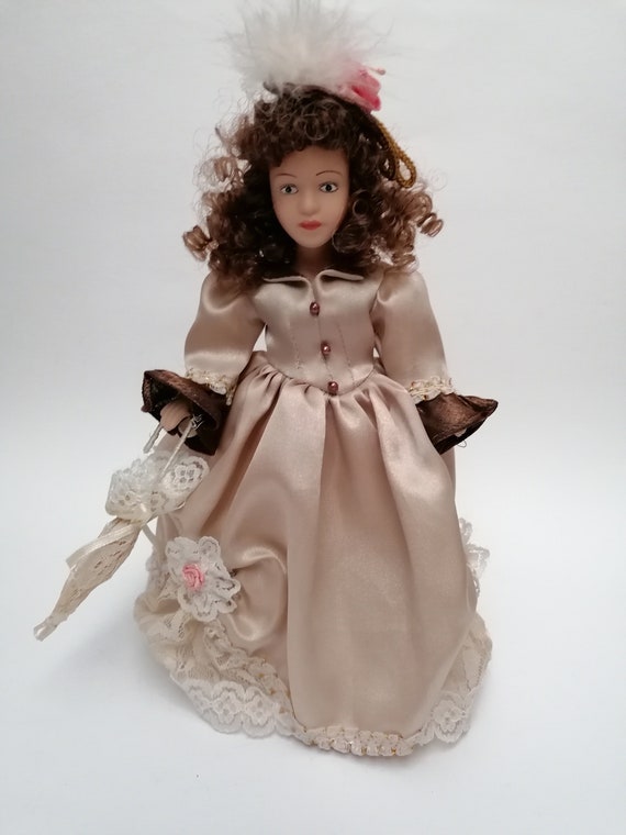 Antica bambola in porcellana, bambola con ombrello, piccola