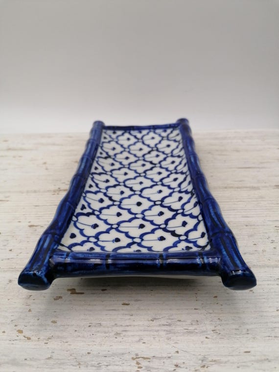 Japanese style ceramic dish in blue and white colors, Japanese ceramic dish.