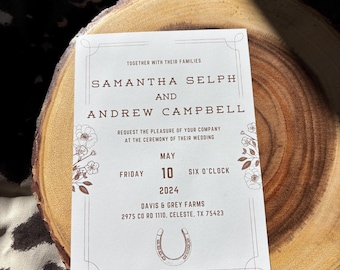 May include: A white rectangular wedding invitation card with brown text and floral illustrations. The text reads: Together with their families, Samantha Selph and Andrew Campbell, request the pleasure of your company at the ceremony of their wedding, May 10, 2024, Friday, six o'clock, Davis & Grey Farms, 2975 Co Rd 1110, Celeste, TX 75423, featuring a horseshoe graphic.