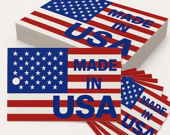 May include: A stack of rectangular stickers featuring the American flag design with the text "MADE IN USA" in blue. The stickers have a red, white, and blue color scheme, with a star field and stripes.