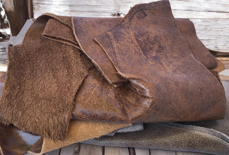 Cowhide Leather Remnants Upholstery Material Supply Natural Brown Leather Various Sizes Available Medium Thickness Hide Perfect Repair Projects Multiple Pieces Included Genuine Leather Collection DIY Craft Material Quality Leather Scraps