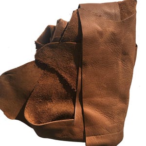 Natural Leather Pieces Genuine Cowhide Remnants Brown Leather Collection Medium Thickness Material DIY Project Supply Various Sizes Available Multiple Fragments Included Perfect Craft Projects Upholstery Grade Material Quality Leather