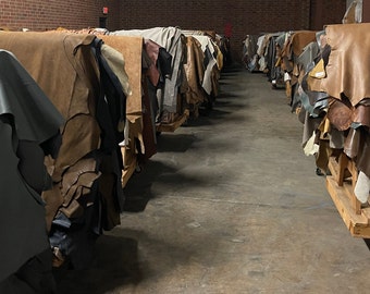 Full upholstery leather cow hides used for making making handbags, purses, wallets and more.  Brown, tan, gray and various other colors