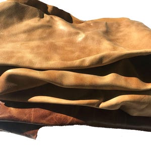 Genuine Leather Scraps Brown Cowhide Remnants Craft Material Bundle Medium Thickness Hide Natural Color Variation Multiple Pieces Collection Different Sizes Available Perfect Small Projects DIY Leather Working Supply Kit Artisan Quality