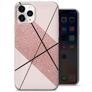 May include: A clear phone case with a pink glitter design and black lines. The case is designed for an iPhone with a camera bump.