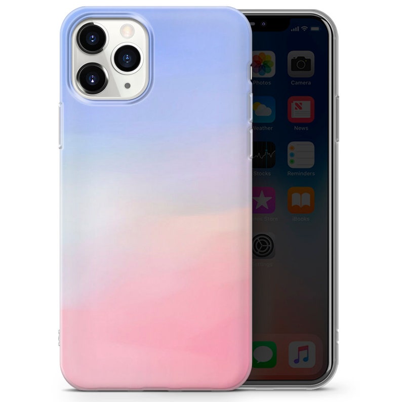 May include: A clear phone case with a gradient design that transitions from light blue to pink. The case is designed for an iPhone.