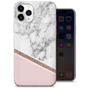 May include: A clear phone case with a white marble design and a pink and gold glitter accent. The case is designed for an iPhone.