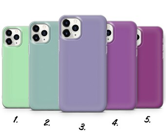 May include: Five different colored phone cases. The cases are all the same style and have a clear back with a colored edge. The colors are light green, light blue, lavender, purple, and pink.