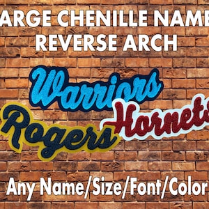 May include: Large chenille letters in a reverse arch design. The letters are in blue, red, and yellow. The text reads "Warriors", "Rogers", and "Hornets". The text "Any Name/Size/Font/Color" is at the bottom of the image.