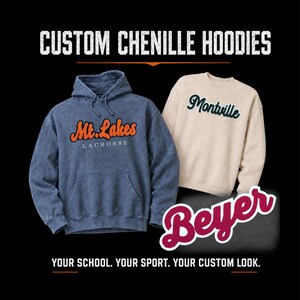 May include: A blue mineral-wash hooded sweatshirt with orange and white 'Mt. Lakes LACROSSE' text and a beige crewneck sweatshirt with dark green 'Montville' text. The image includes the text 'CUSTOM CHENILLE HOODIES', 'Beyer', and 'YOUR SCHOOL. YOUR SPORT. YOUR CUSTOM LOOK.'