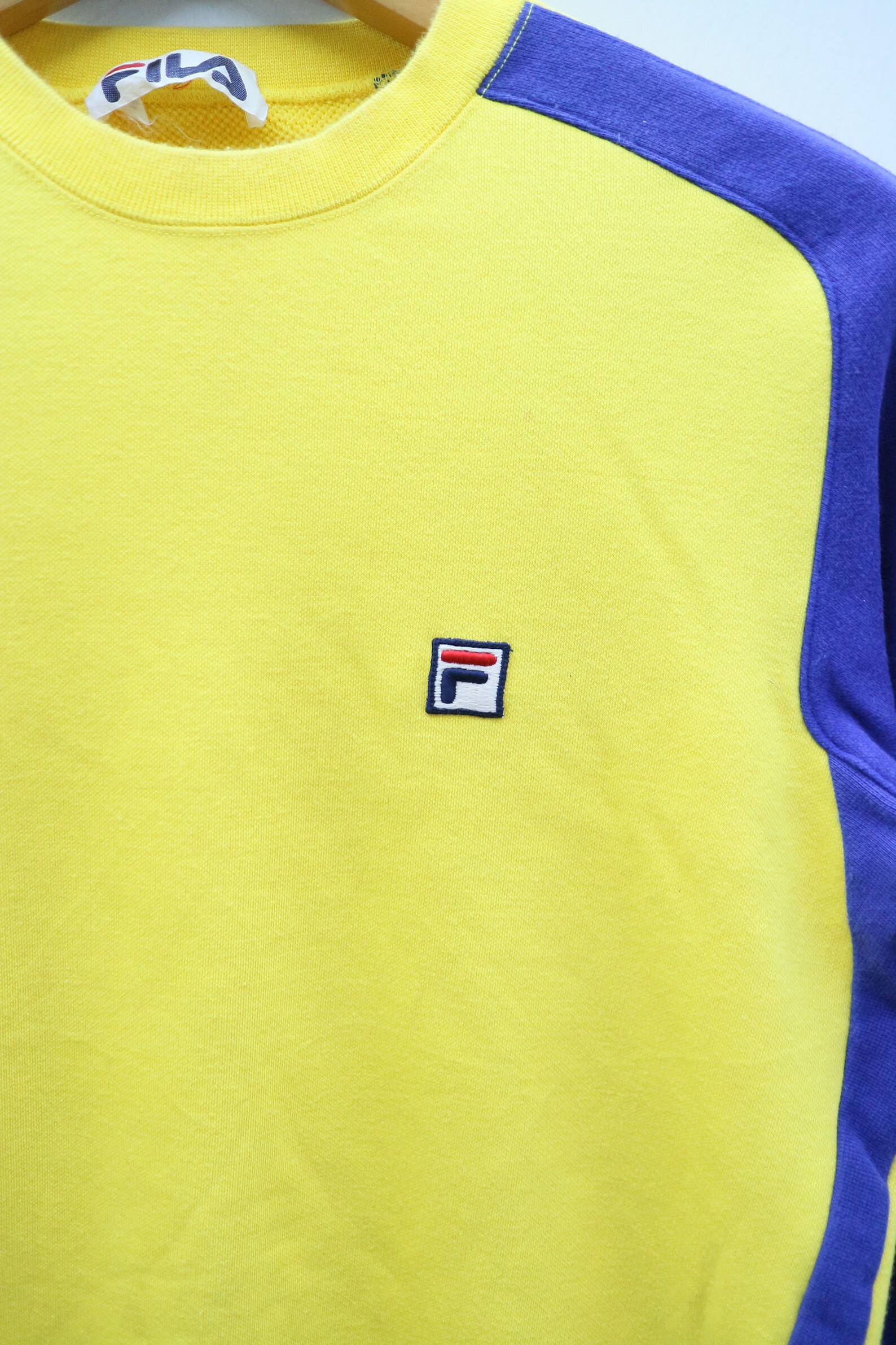 yellow fila jumper