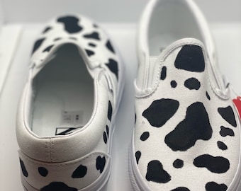 leather slip on vans all black