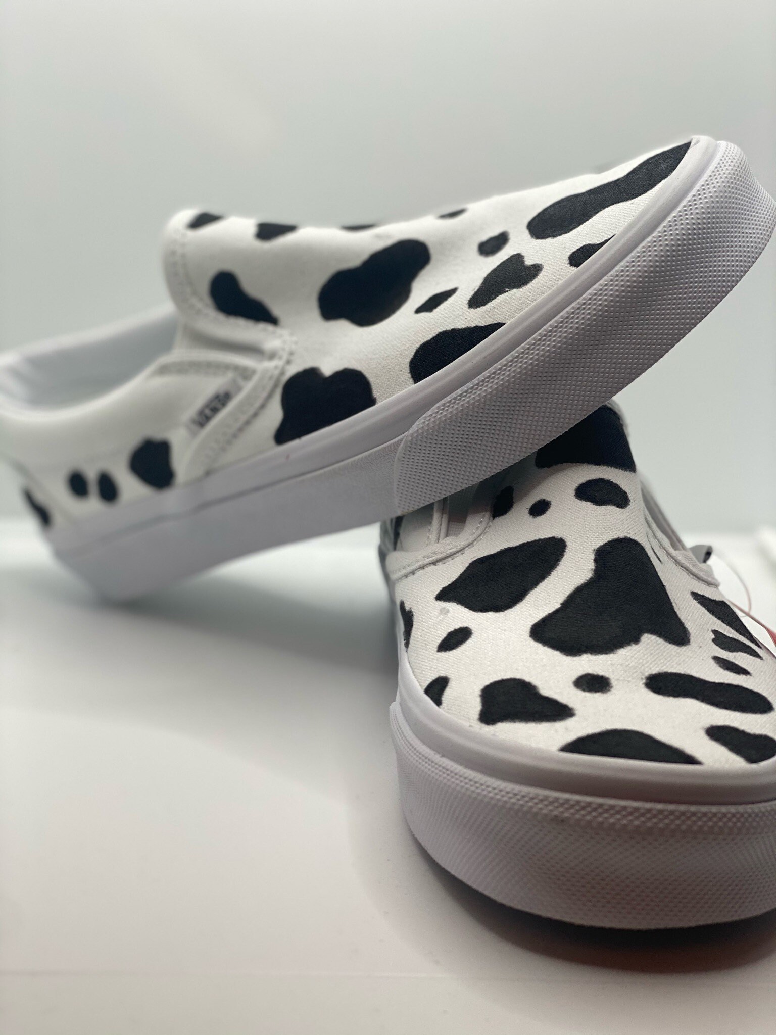 vans cow slip on