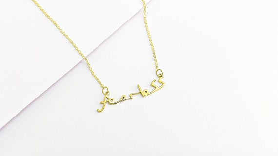 louis tomlinson necklace