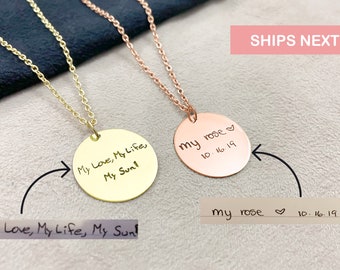 May include: Two gold necklaces with round pendants. The pendant on the left necklace is engraved with the text "My Love, My Life, My Sunl". The pendant on the right necklace is engraved with the text "my rose 10.16.19".