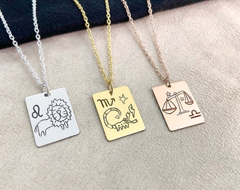 May include: Three silver, gold, and rose gold necklaces with square pendants featuring zodiac signs. The pendants are engraved with the symbols for Leo, Scorpio, and Libra.