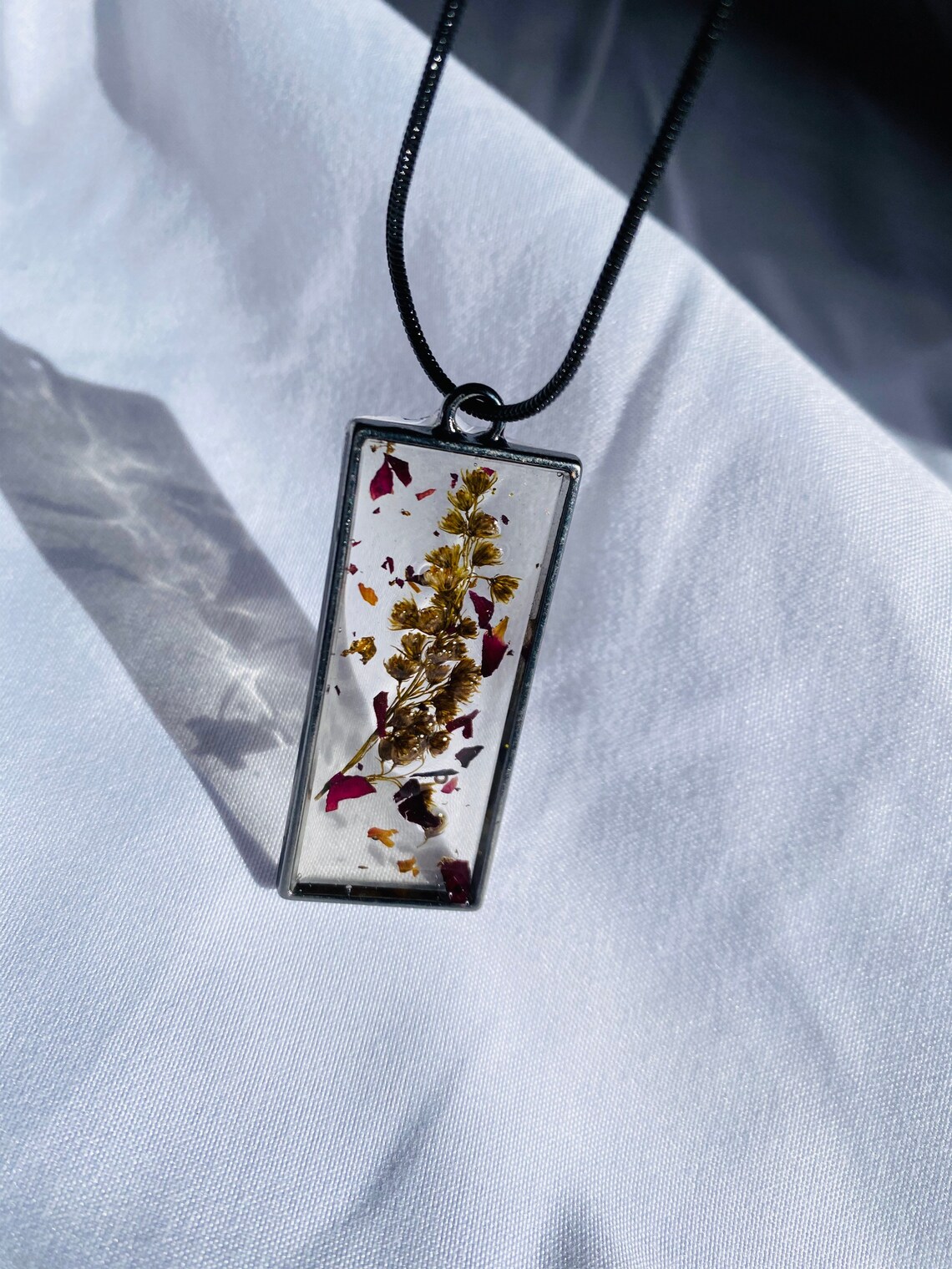 Handmade resin flower pendant Etsy