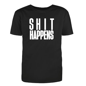 May include: Black t-shirt with white text that reads "SHIT HAPPENS".