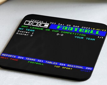 May include: Black square coaster with a retro BBC Football graphic. The coaster displays a football score, team information, and the date. The text is in white, green, and blue on a black background. A unique gift for sports fans.