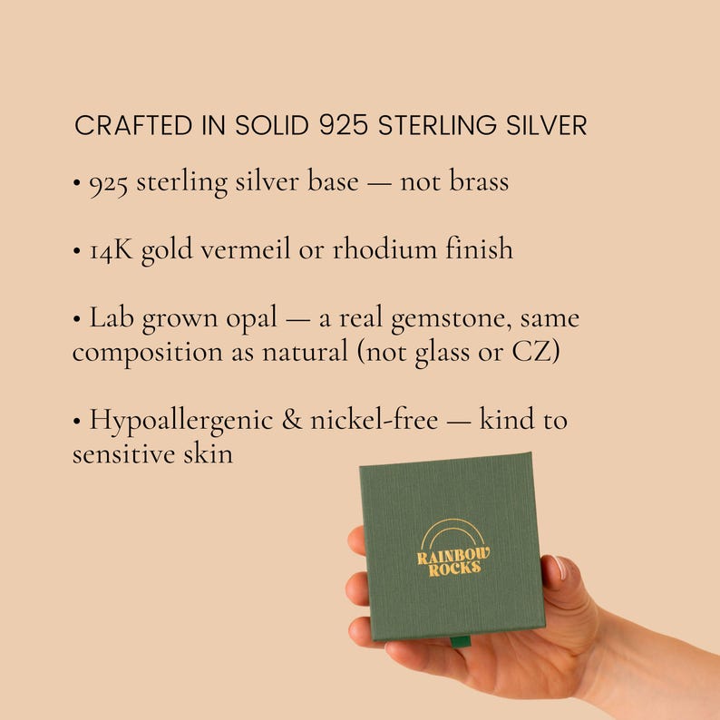 May include: A square dark green jewelry box with the gold text RAINBOW ROCKS and a rainbow icon. Text above reads: CRAFTED IN SOLID 925 STERLING SILVER, 925 sterling silver base, 14K gold vermeil or rhodium finish, lab grown opal, hypoallergenic & nickel-free.