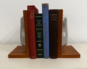 Pair of Aluminum Mold Bookends Mounted on Mahogany