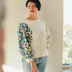 Ukrainian embroidered blouse,
beige linen blouse,
boho embroidered shirt,
handmade Ukrainian top,
ethnic embroidered blouse,
traditional Ukrainian blouse,
bohemian linen shirt,
embroidered linen top,
heritage embroidery shirt,
Slavic embroidered