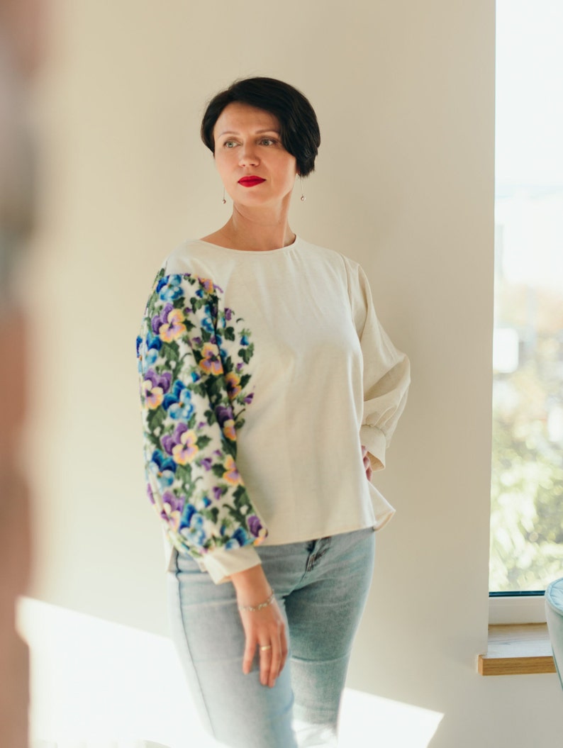 Ukrainian embroidered blouse,
beige linen blouse,
boho embroidered shirt,
handmade Ukrainian top,
ethnic embroidered blouse,
traditional Ukrainian blouse,
bohemian linen shirt,
embroidered linen top,
heritage embroidery shirt,
Slavic embroidered