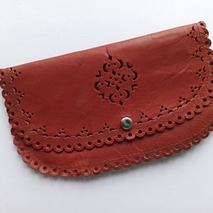 Vintage red leather wallet, retro coin box of 80s