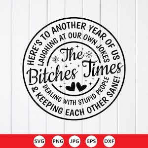 May include: A black and white circular design with text that reads "Here's to another year of us laughing at our own jokes & keeping each other sane!" The words "The Bitches Times" are in the center, with two heart shapes below.