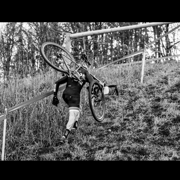 Cyclocross Bike Racing Action - A High Resolution Black and White Cyclocross Racer In Action During a Cyclocross Bike race