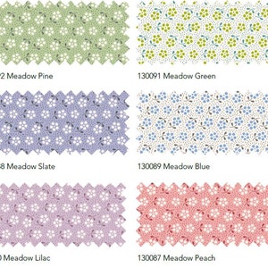 May include: Four fabric swatches with a white floral pattern on a variety of colored backgrounds. The swatches are labeled with the following names and numbers: Meadow Pine (130092), Meadow Green (130091), Meadow Slate (130088), Meadow Blue (130089), Meadow Lilac (130090), and Meadow Peach (130087).