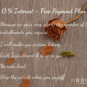 May include: A wooden background with text promoting a free payment plan. A dried rose and scattered leaves are present. The text includes "0% Interest - Free Payment Plan" and details about installments and shipping.