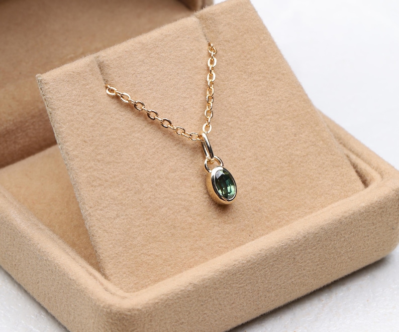 Christmas Sale
Christmas Sale For Jewelry
Christmas Gift
Christmas Gift For Her
Black Friday Sale
Black Friday Sale For Jewelry
Minimalist Green Sapphire Pendant Necklace
Teal sapphire Oval Shaped pendant
Solitaire And Dainty Pendant
Birthday Gift 
Anniversary Gift
pendant necklace
minimalist necklace
dainty necklace
silver pendant
pendant charms
necklace for women
Green Sapphire
Gemstone Necklace
Green Oval Sapphire
Gift For Her
Sapphire Pendant
September Birthstone
September Birthstone RING