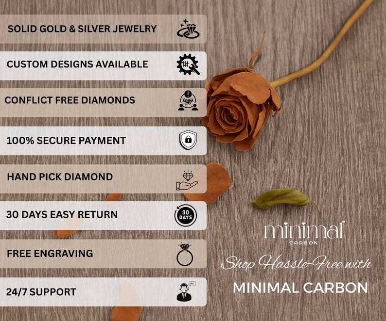 May include: Image features a dried rose and text on a wooden surface. Text includes "SOLID GOLD & SILVER JEWELRY", "CUSTOM DESIGNS AVAILABLE", "CONFLICT FREE DIAMONDS", "100% SECURE PAYMENT", "HAND PICK DIAMOND", "30 DAYS EASY RETURN", "FREE ENGRAVING", and "24/7 SUPPORT". The brand name "minimal CARBON" is also visible.