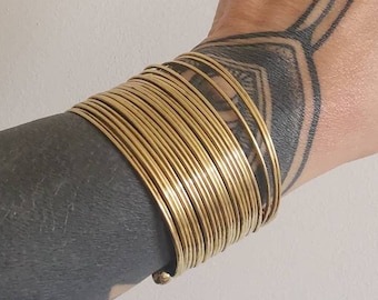 Cuff bracelet in golden brass, wide statement bangle with multiple rows