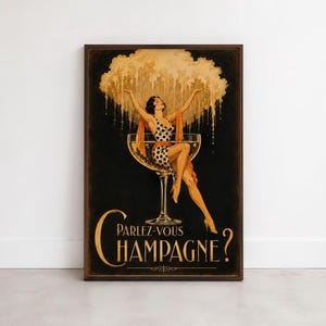 May include: A rectangular wall art print featuring a black background with a woman in a black and white polka dot dress sitting inside a large champagne glass. Above her is a golden cloud-like splash. The text reads Parlez-vous Champagne?
