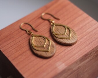 gold-plated earrings with hand-carved oak disc