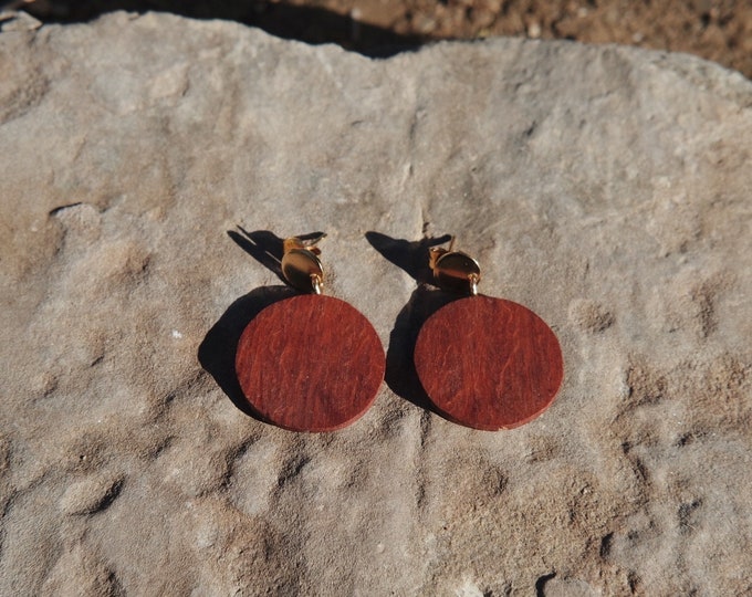 Gold plated earrings with hand carved Figured Jarrah circle disc