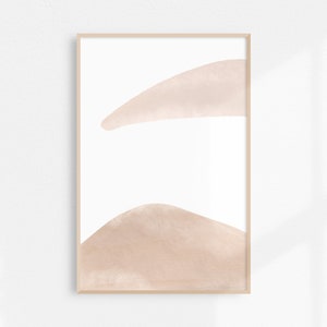 May include: Abstract art print with two soft pink watercolor shapes on a white background. The shapes are organic and flowing, creating a minimalist and modern aesthetic.