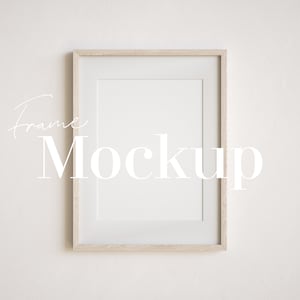 May include: A simple wooden frame mockup with a white mat and a white background. The text "Frame Mockup" is written in white on the image.