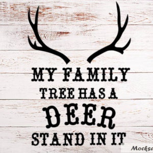 May include: Black and white graphic design with a silhouette of deer antlers. The text reads "My family tree has a deer stand in it."