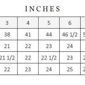 May include: A size chart in inches for clothing, showing measurements for height, chest, waist, and hip. The chart includes sizes from 12 months to 14 years.