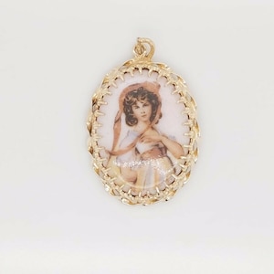Colgante con retrato de mujer antiguo en oro amarillo de 14 k