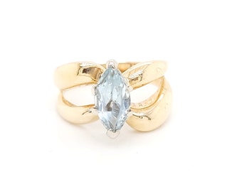 14k Yellow Gold Ring With A Marquise Shape Light Blue Birthstone