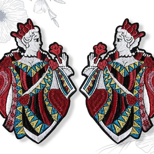 May include: Two embroidered patches of the Queen of Hearts. Each patch shows a woman in a red and black gown, holding a red rose. The patches have a white outline. The patches are suitable for sewing.