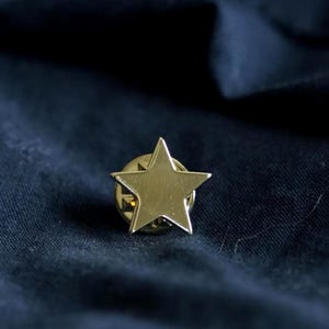 Insigne métallique étoile dorée (15 mm)