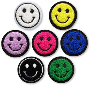 May include: Set of eight embroidered smiley face patches in various colours, including white, yellow, pink, blue, black, and green. Each patch is approximately 2 inches in diameter.