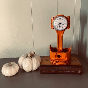 Piston Clock Orange