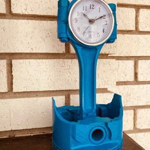 Piston Clock Grabber Blue